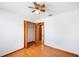 Bedroom with hardwood floors and closet at 3226 Cherry Hill S Cir, Lakeland, FL 33810