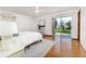 Bright bedroom with sliding glass doors offering backyard access at 3226 Cherry Hill S Cir, Lakeland, FL 33810