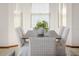 Elegant dining room with stylish furniture and a modern centerpiece creates a welcoming atmosphere at 3226 Cherry Hill S Cir, Lakeland, FL 33810