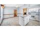 Bright kitchen with a modern island and an open floorplan at 3226 Cherry Hill S Cir, Lakeland, FL 33810