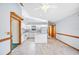 Spacious kitchen with island features white cabinets, and modern appliances, neutral flooring, and ample light at 3226 Cherry Hill S Cir, Lakeland, FL 33810