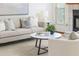 Cozy living room with fireplace featuring comfortable seating, neutral colors and stylish decor at 3226 Cherry Hill S Cir, Lakeland, FL 33810