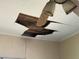 Damaged ceiling with a hole exposing the beams needing repair in the room at 445 Choctaw Ave, Lakeland, FL 33815