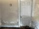 Weathered walls and damaged trim showcase the need for renovation at 445 Choctaw Ave, Lakeland, FL 33815