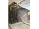 Damaged wall with rotted wood and missing drywall at 445 Choctaw Ave, Lakeland, FL 33815