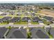 Aerial view of a well-planned community featuring modern homes with spacious yards at 6627 Ridgemont Rd, Lakeland, FL 33813
