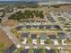 An aerial shot of a new home community with well-manicured lawns and contemporary architectural designs at 6627 Ridgemont Rd, Lakeland, FL 33813