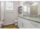 Bathroom featuring modern sink and countertop, toilet, and shower-tub combination at 6627 Ridgemont Rd, Lakeland, FL 33813