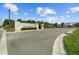 TreyMont community entrance sign with stone pillars and wrought iron gate under a sunny sky at 6627 Ridgemont Rd, Lakeland, FL 33813