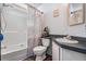 Bathroom features a shower-tub combination, toilet, and vanity with a mirror at 7011 Tall Pine Rd, Polk City, FL 33868
