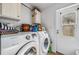 Bright laundry room with modern washer and dryer at 7011 Tall Pine Rd, Polk City, FL 33868