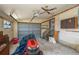Garage with rolling door and storage cabinets; some tools are visible at 101 S Cleveland Ave, Fort Meade, FL 33841
