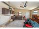 Functional garage space with storage cabinets, work area, and garage door opener at 101 S Cleveland Ave, Fort Meade, FL 33841
