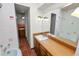 Bathroom with brick floor and view of the shower and tub at 1205 Rolling Woods Ln, Lakeland, FL 33813