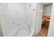 Bathroom with a shower and brick flooring at 1205 Rolling Woods Ln, Lakeland, FL 33813
