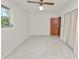 Bedroom with a ceiling fan and window at 1205 Rolling Woods Ln, Lakeland, FL 33813