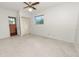 Bright bedroom with a window and a closet, showcasing a peaceful setting at 1205 Rolling Woods Ln, Lakeland, FL 33813