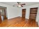 This bedroom features hardwood floors and cedar lined closets at 1205 Rolling Woods Ln, Lakeland, FL 33813