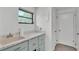 Laundry Room with tile flooring and a utility sink at 1433 Ellison Ln, Lakeland, FL 33801