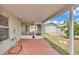 The back porch offers backyard views, featuring a shed for extra storage at 1520 Caroline Ct, Bartow, FL 33830