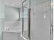 Bathroom featuring a large soaking tub and a glass-enclosed shower at 1520 Caroline Ct, Bartow, FL 33830