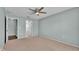 Spacious bedroom with neutral carpet and a ceiling fan at 1520 Caroline Ct, Bartow, FL 33830