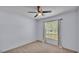 Bedroom with carpet, natural light, and ceiling fan at 1520 Caroline Ct, Bartow, FL 33830