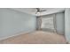 Bedroom featuring plush carpet, a ceiling fan, and a bright window at 1520 Caroline Ct, Bartow, FL 33830