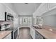 Modern kitchen featuring stainless steel appliances, stylish backsplash, and sleek countertops at 1520 Caroline Ct, Bartow, FL 33830
