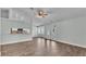 Spacious living room featuring wood floors and lots of natural light at 1520 Caroline Ct, Bartow, FL 33830