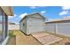Backyard shed with a ramp for easy access and additional storage space at 1520 Caroline Ct, Bartow, FL 33830