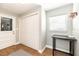 Hallway nook with a window, small table, closet and access to the kitchen at 1536 Del Crest Pl, Lakeland, FL 33803