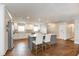 Open concept kitchen with stainless steel appliances, white cabinets and an island with seating at 1536 Del Crest Pl, Lakeland, FL 33803