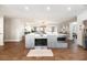Bright kitchen with stainless steel appliances, a center island and open floor plan to the living room at 1536 Del Crest Pl, Lakeland, FL 33803