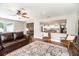 Open-concept view of living room and dining room with wood-look tile floors at 1536 Del Crest Pl, Lakeland, FL 33803