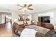 Inviting living room with open floor plan and wood-look tile floors at 1536 Del Crest Pl, Lakeland, FL 33803