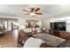 Bright living room with open floor plan and wood-look tile floors at 1536 Del Crest Pl, Lakeland, FL 33803