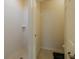 Bright bathroom featuring a tiled shower with built-in shelves and neutral colored walls at 1620 Linz Ct, Winter Haven, FL 33884