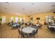 Spacious clubhouse featuring tables, chairs, and plenty of room for gatherings and community events at 1620 Linz Ct, Winter Haven, FL 33884
