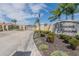 Well-maintained community entrance with lush greenery and attractive signage, creating a welcoming atmosphere at 1620 Linz Ct, Winter Haven, FL 33884
