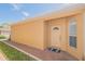 Inviting front entrance with a classic door, brick walkway, and well-maintained landscaping at 1620 Linz Ct, Winter Haven, FL 33884