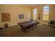 Recreational game room with a pool table and windows providing natural light at 1620 Linz Ct, Winter Haven, FL 33884