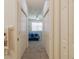 Hallway with bedrooms visible and connecting the bathroom at 1620 Linz Ct, Winter Haven, FL 33884