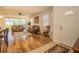 Inviting living room featuring wood floors, comfortable seating, and sliding glass doors to the patio at 1620 Linz Ct, Winter Haven, FL 33884