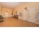Community lobby with tiled floor, neutral walls, and seating area near the movie theatre at 1620 Linz Ct, Winter Haven, FL 33884