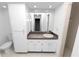A full bathroom features a walk-in shower, toilet, and a vanity with plenty of storage at 2025 Sylvester Rd # E2, Lakeland, FL 33803