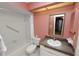 Full bathroom features a shower-tub combination, a toilet, and a vanity with plenty of storage space at 2025 Sylvester Rd # E2, Lakeland, FL 33803