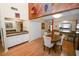 Bright dining area with a wet bar, seating for four, and bamboo floors at 2025 Sylvester Rd # E2, Lakeland, FL 33803