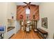 Open-concept dining area with high ceilings, wood paneling, and seamless flow to the kitchen and living spaces at 2025 Sylvester Rd # E2, Lakeland, FL 33803