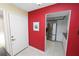 Bright foyer leads into a modern kitchen with stainless steel appliances, creating an open and inviting space at 2025 Sylvester Rd # E2, Lakeland, FL 33803